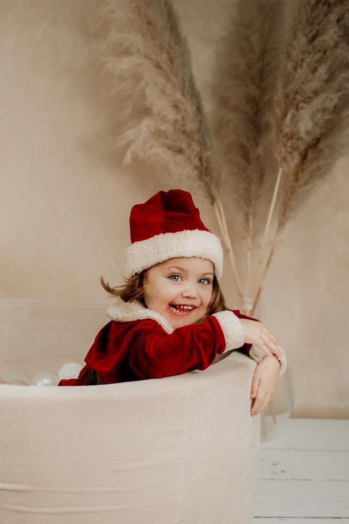 Kerstfoto’s in het ballenbad: 10 leuke ideeën voor een unieke kerstkaart
